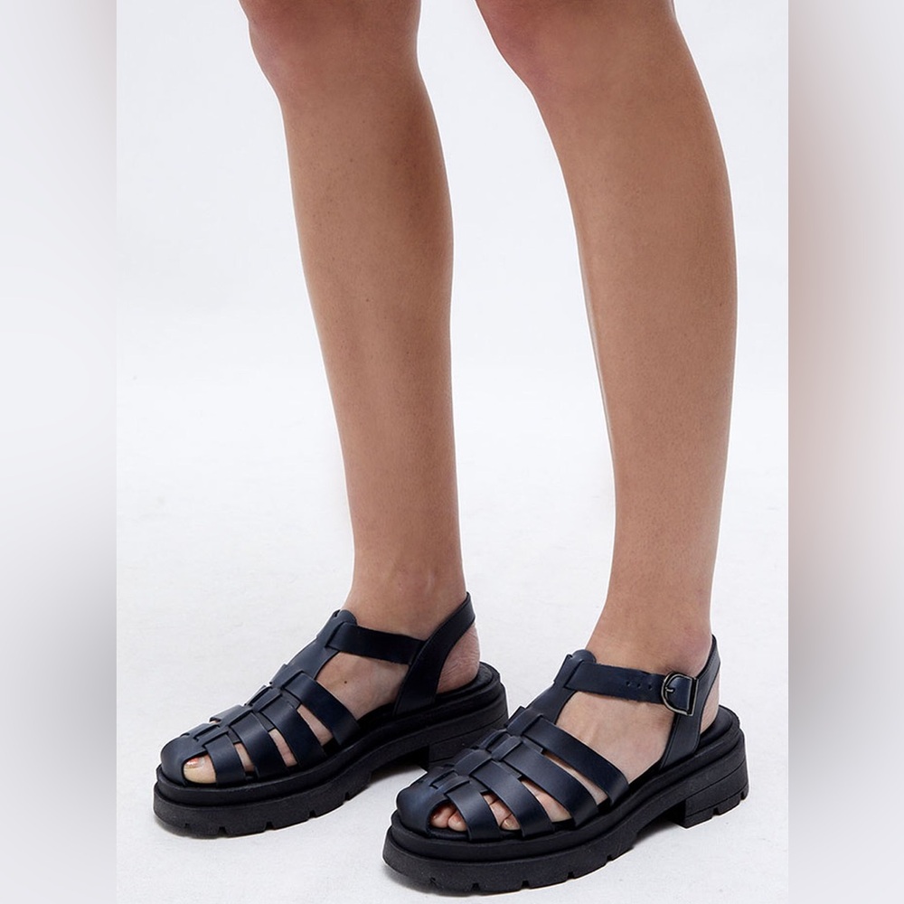 Free People Black Platform Sandals with Strappy Design